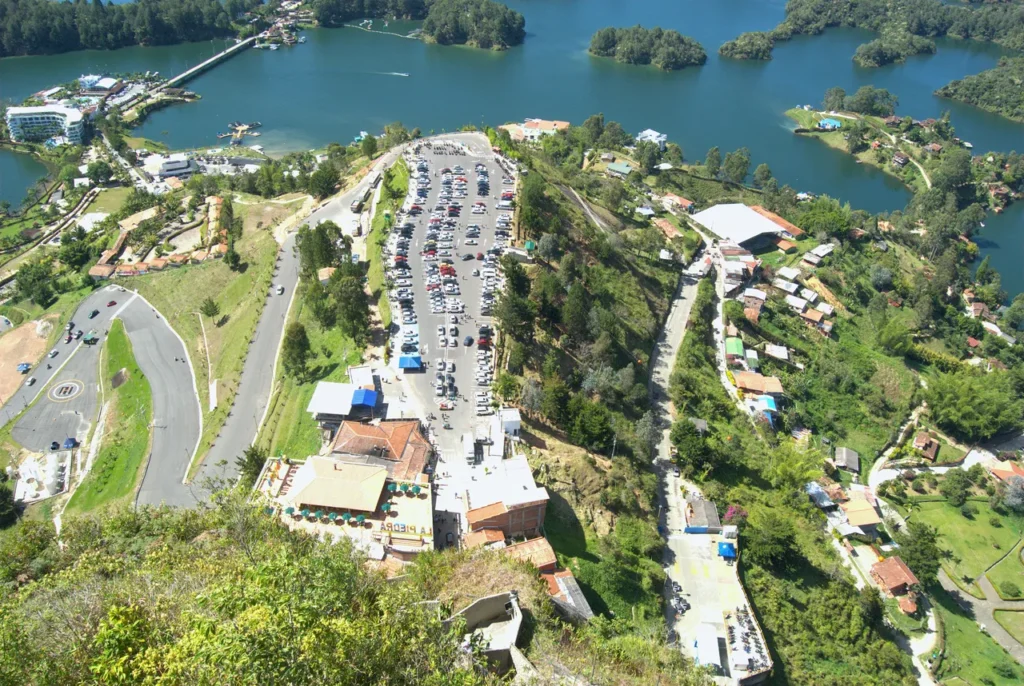 View down from the staircase of El Peñón de Guatapé toward the base restaurant area]